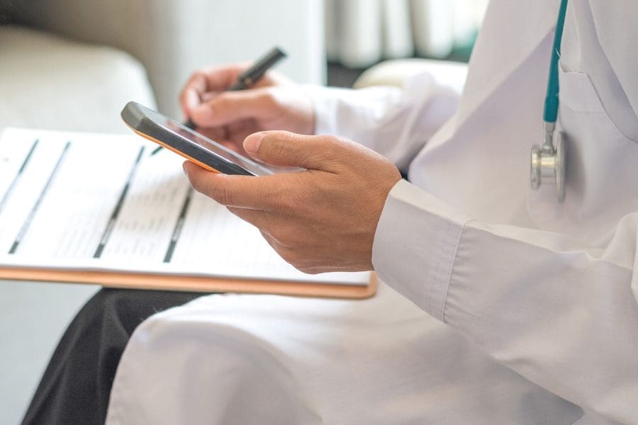 Doctor writing notes